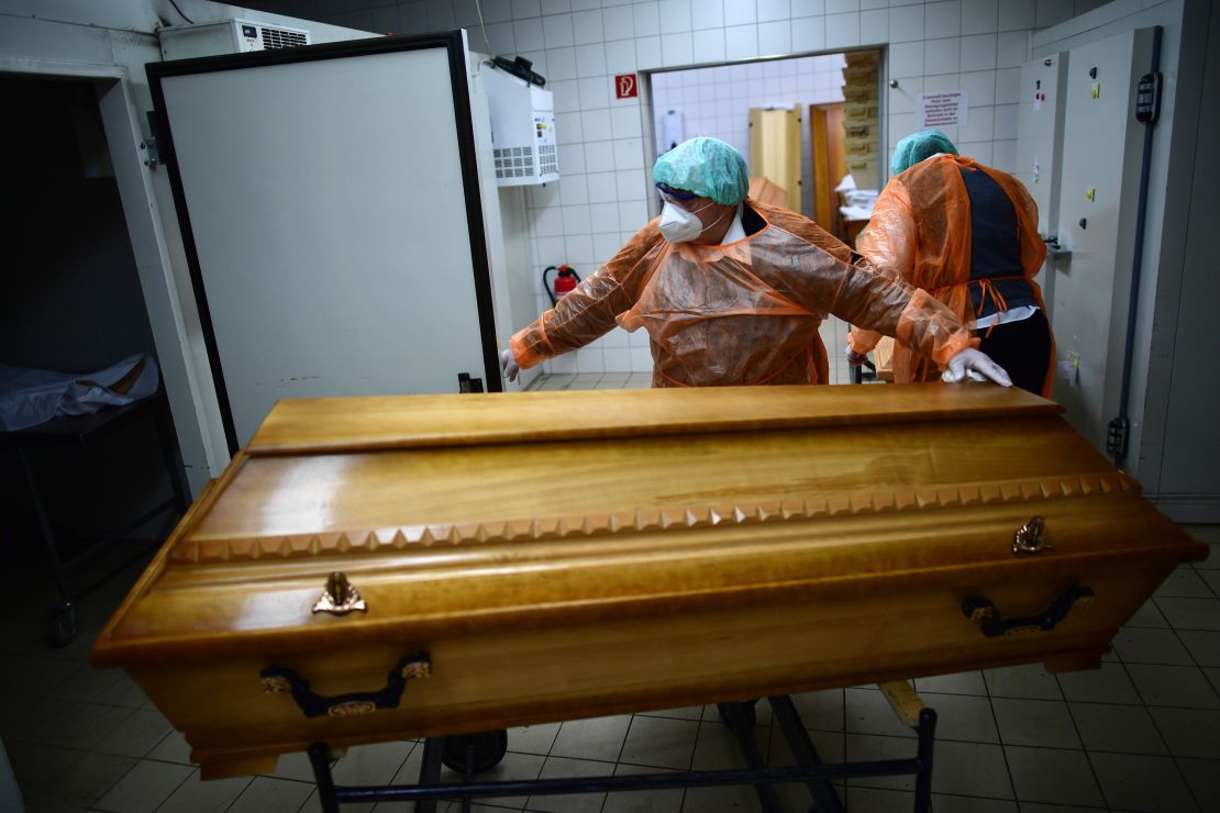 Funeral home workers move coffins of Covid-19 victims in Annaberg-Buchholz in the state of Saxony on December 7, as the country experiences a new surge in infections and deaths.