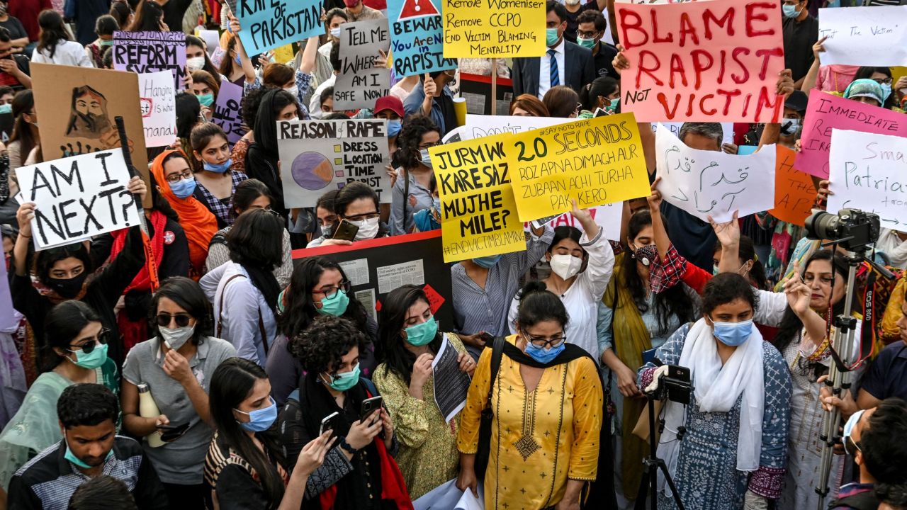 Human right activists march during a protest against an alleged gang rape of a woman, in Lahore on September 12, 2020.
