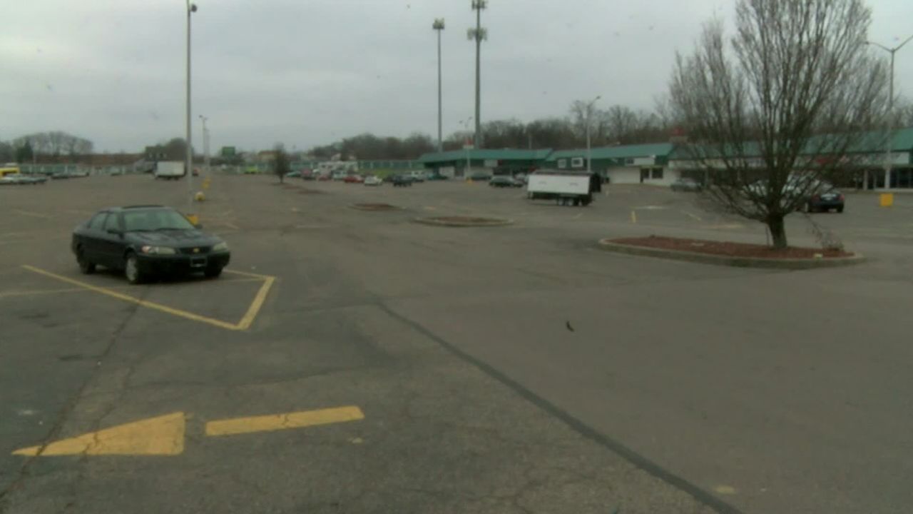 The parking lot at Hilltop Plaza where the kids were unloaded by a bus driver.