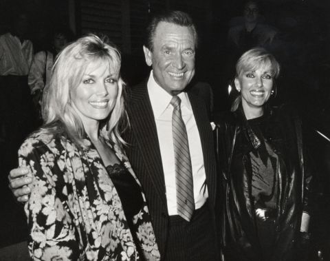 Barker poses with two "Price Is Right" models — Dian Parkinson, left, and Janice Pennington — in 1986. Parkinson sued Barker for sexual harassment in 1993, asking for $8 million. Barker denied the allegations and said they had a consensual relationship. The lawsuit was dropped in 1995.