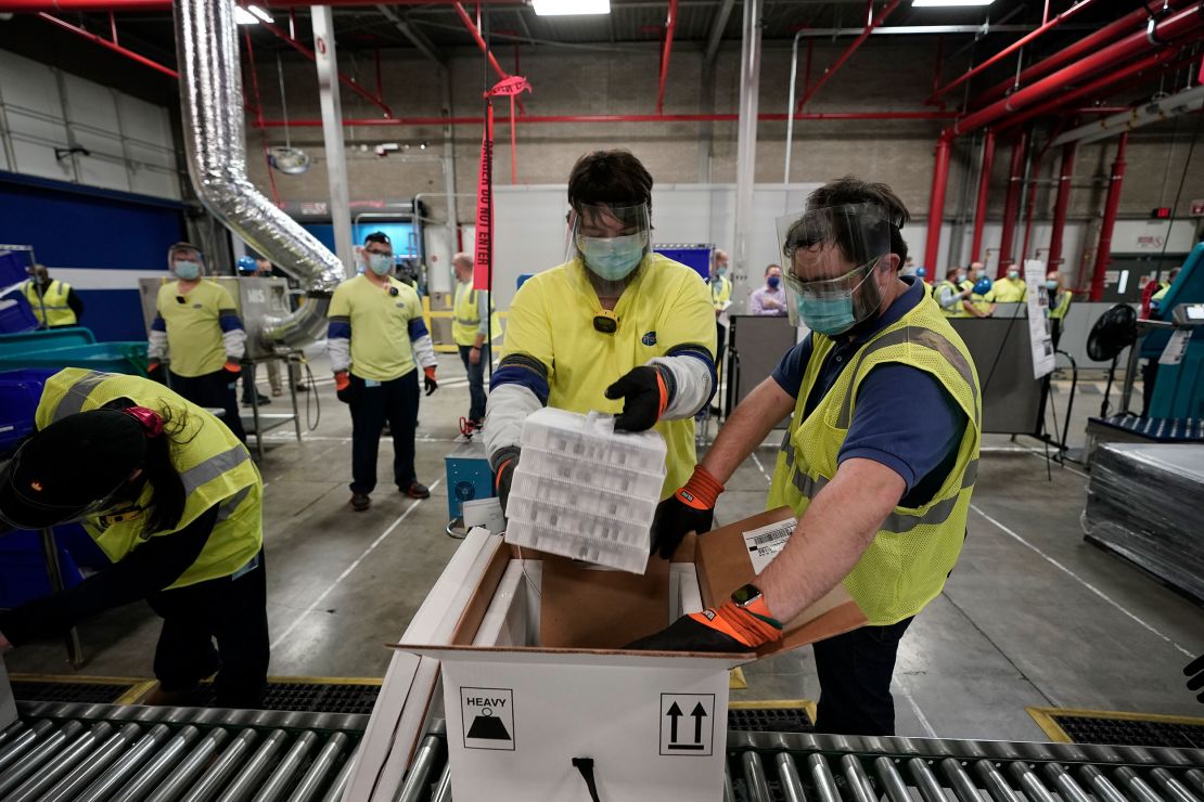 Boxes containing COVID-19 vaccines are prepared to be shipped at the Pfizer Global Supply Kalamazoo manufacturing plant in Portage, Michigan. 