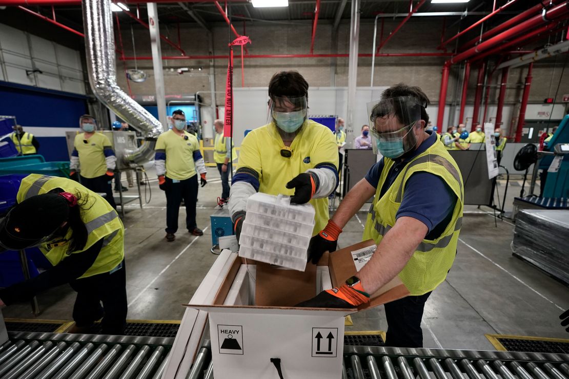 Boxes containing COVID-19 vaccines are prepared to be shipped at the Pfizer Global Supply Kalamazoo manufacturing plant in Portage, Michigan.