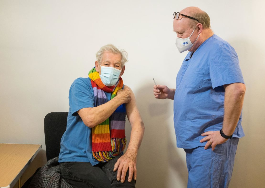 Ian McKellen talks to Dr Phil Bennett-Richards as he receives his first dose of the Covid-19 vaccine.