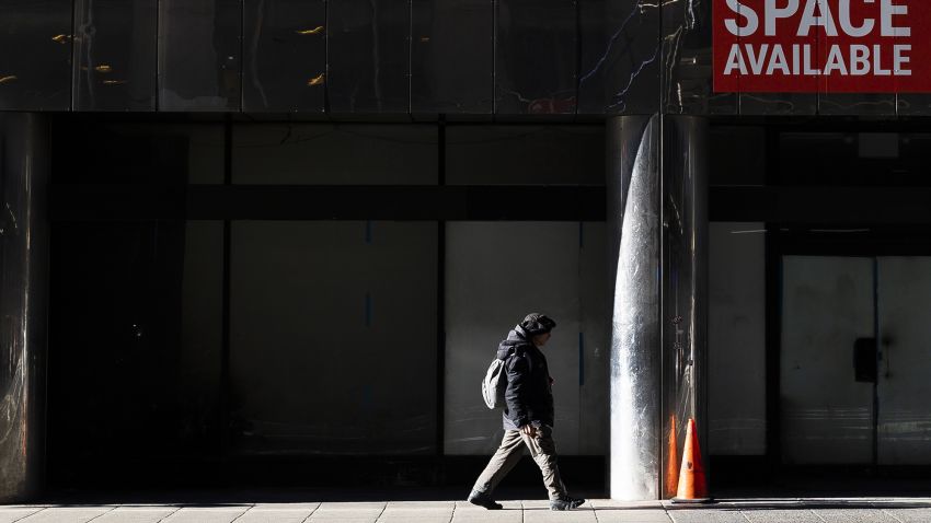 A man walks past a closed retail store location in New York, New York, USA, on 07 December 2020. As a result of the continuing economic effects of the coronavirus pandemic New York City is facing a massive budget shortfall and a bleak economic forecast with the unemployment rate in the city, as of October, at 13.2 percent, according to the New York State Department of Labor.