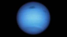 This Hubble Space Telescope snapshot of the dynamic blue-green planet Neptune reveals a monstrous dark storm (top center) and the emergence of a smaller dark spot nearby (top right). The giant vortex, which is wider than the Atlantic Ocean, was traveling south toward certain doom by atmospheric forces at the equator when it suddenly made a U-turn and began drifting back northward.
Credits: NASA, ESA, STScI, M.H. Wong (University of California, Berkeley), and L.A. Sromovsky and P.M. Fry (University of Wisconsin-Madison)