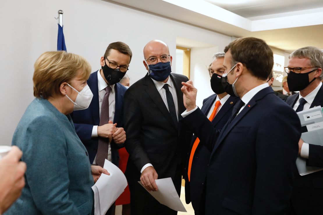 German Chancellor Angela Merkel, European Council President Charles Michel (center) and Macron at the EU Leaders Summit in Brussels on Friday, December 11.