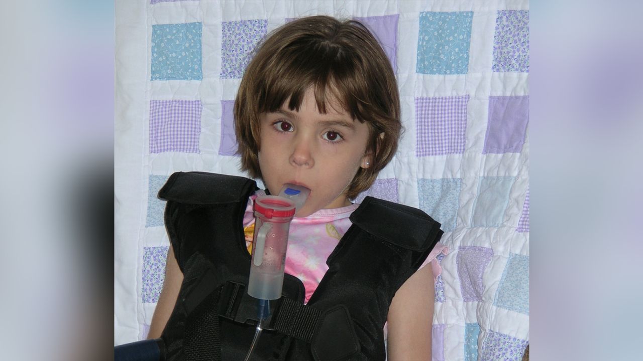 Six-year-old Andrea Hoffman in 2007 doing her airway clearance treatment at home.
