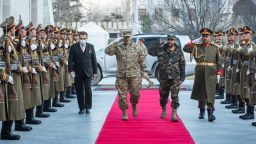 Gen. Mark A. Milley, chairman of the Joint Chiefs of Staff, walks through an honor cordon with Gen. Mohammad Yasin Zia, Chief of General Staff of the Afghan Armed Forces at the presidential palace prior to a meeting with Ashraf Ghani, President of the Islamic Republic of Afghanistan in Kabul, Dec. 17, 2020.  The senior leaders discussed the current security environment in Afghanistan. 
