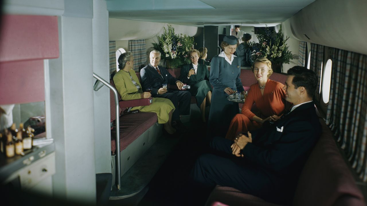 Guests chatted during their flight in the lower lounge, which seated 14 people.