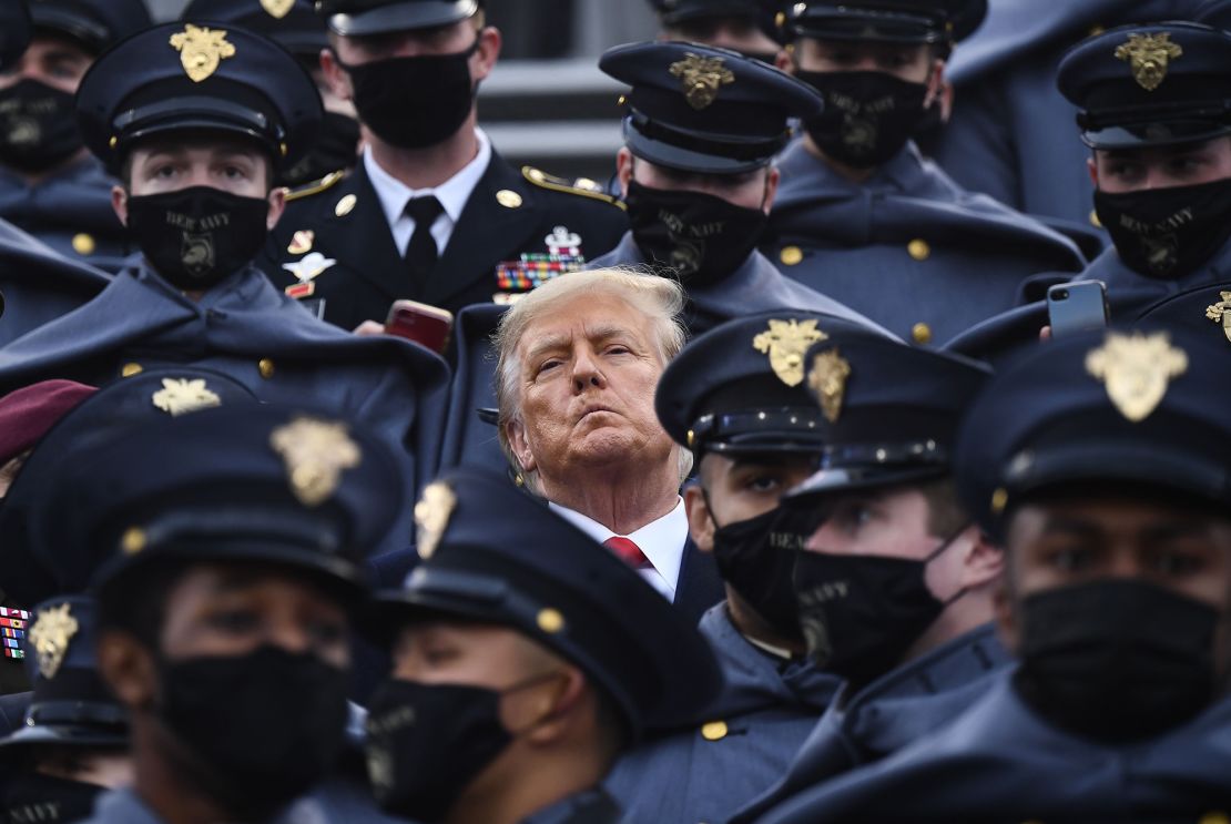 US President Donald Trump joins West Point cadets during the Army-Navy football game at Michie Stadium on December 12, 2020 in West Point, New York. (Photo by Brendan Smialowski / AFP) (Photo by BRENDAN SMIALOWSKI/AFP via Getty Images)