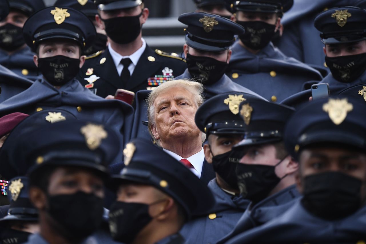 US President Donald Trump joins Army cadets during the Army-Navy football game on Saturday, December 12. He also spent some time in the Navy section.