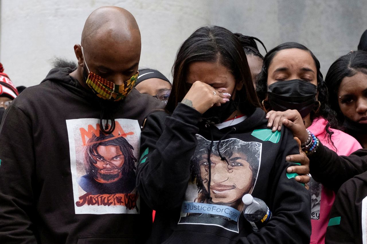 Attorney Sean Walton comforts Tamala Payne, the mother of Casey Goodson Jr., during a protest outside the Statehouse in Columbus, Ohio, on Saturday, December 12. Goodson, 23, was killed by a sheriff's deputy earlier this month, and <a href="https://www.cnn.com/2020/12/12/us/casey-goodson-jr-what-we-know/index.html" target="_blank">the shooting</a> is now the subject of a civil rights investigation by the US Attorney's Office in Southern Ohio. The Columbus Division of Police is also investigating.