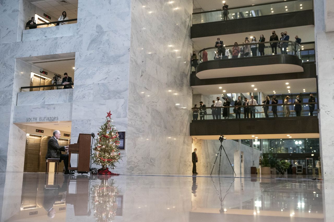 US Sen. Lamar Alexander plays Christmas songs on a piano inside the Hart Senate Office Building on Wednesday, December 16. 