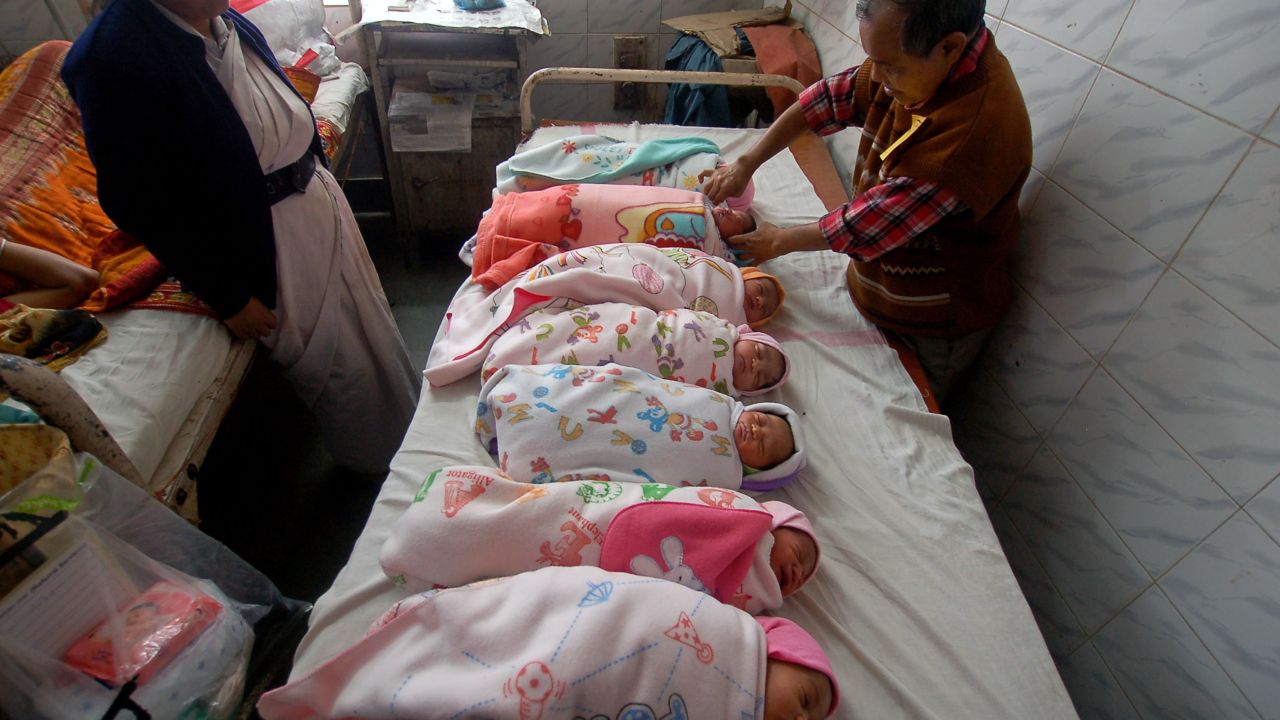 An Indian health official administers polio vaccination drops to newborn babies at a hospital in Agartala, India's northeastern state of Tripura.