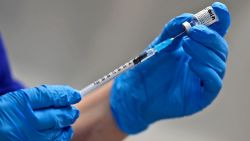 LONDON, ENGLAND - DECEMBER 08: A nurse prepares to administer the Pfizer-BioNTech COVID-19 vaccine at Guy's Hospital at the start of the largest ever immunisation programme in the UK's history on December 8, 2020 in London, United Kingdom. More than 50 hospitals across England were designated as covid-19 vaccine hubs, the first stage of what will be a lengthy vaccination campaign. NHS staff, over-80s, and care home residents will be among the first to receive the Pfizer/BioNTech vaccine, which recently received emergency approval from the country's health authorities. (Photo by Frank Augstein - Pool / Getty Images)