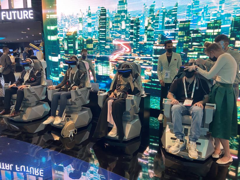 Visitors participate in a virtual reality autonomous flight simulation.