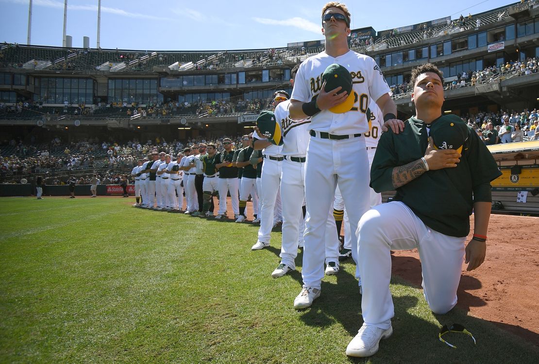 Bruce Maxwell kneels in protest on September 24, 2017.