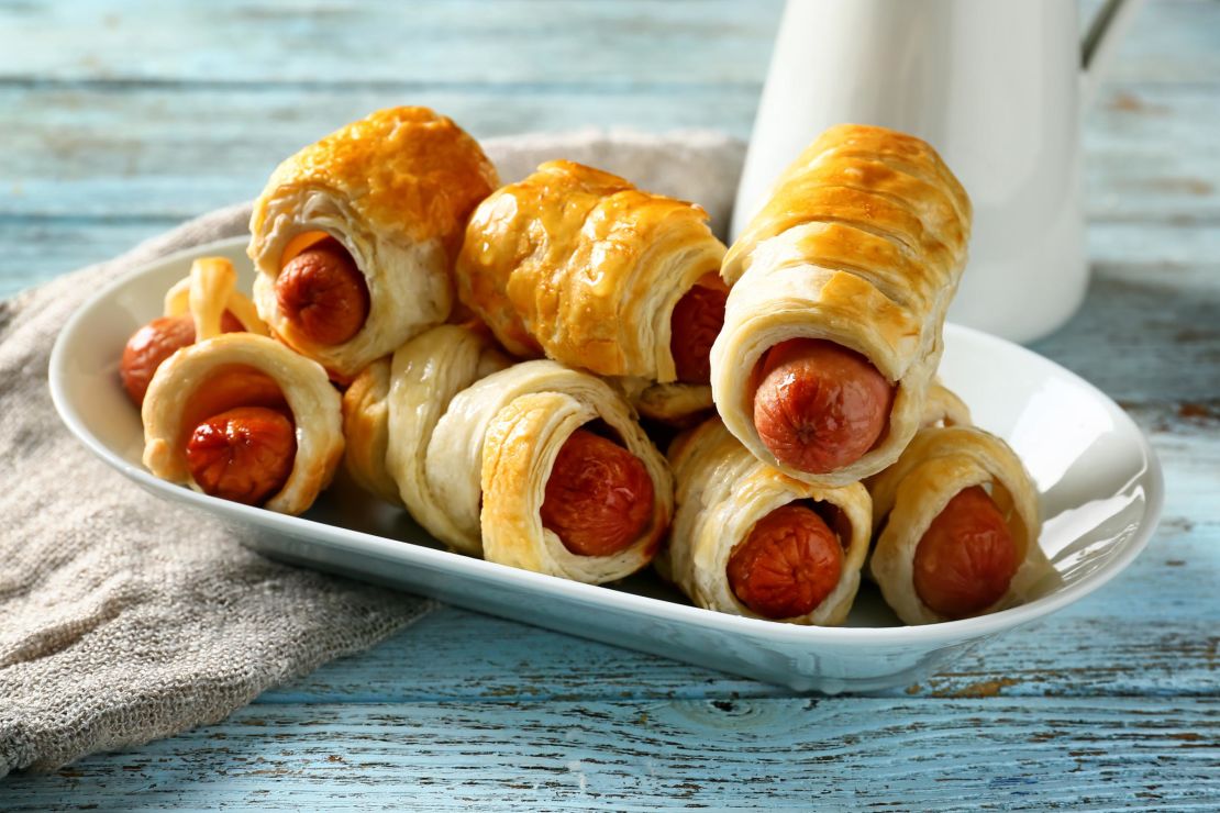 For '60s cocktail-party flare, bite-size pigs in a blanket deliver.