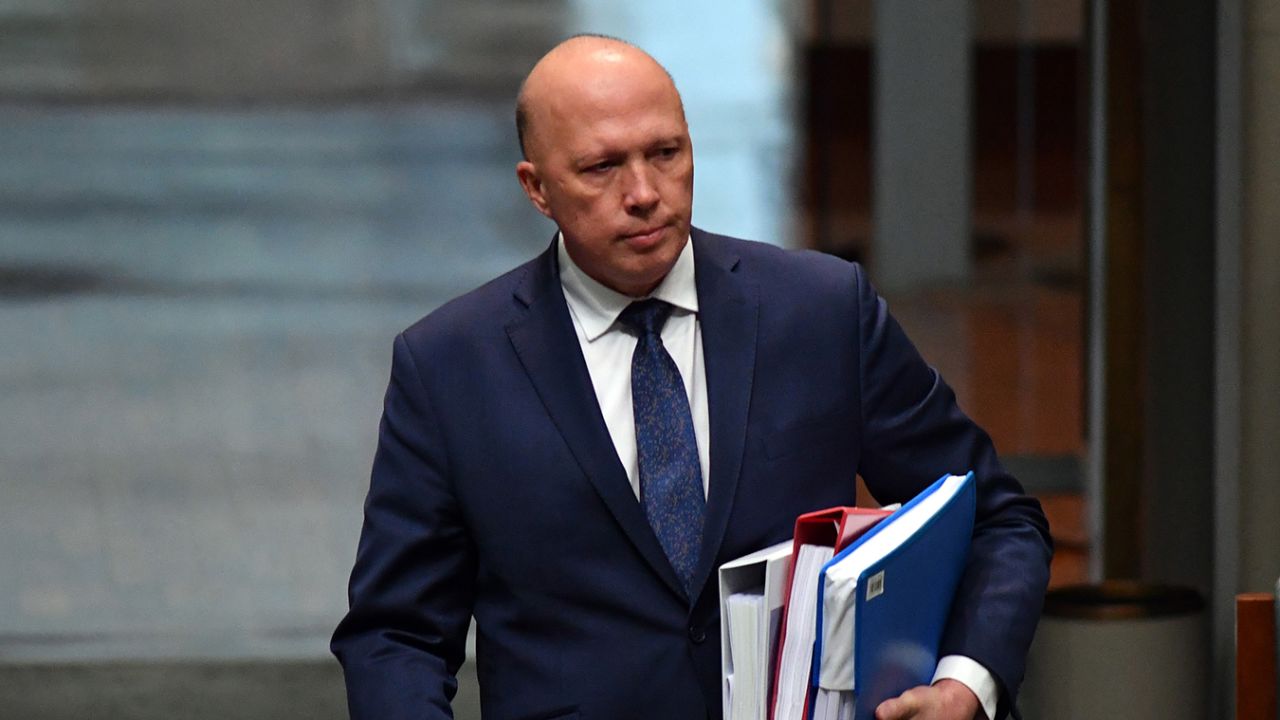 Australia's Home Affairs minister Peter Dutton was threatened with contempt of court over a visa case.