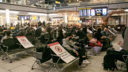 Christmas travellers at a busy  Terminal 5 Heathrow airport as many people have made preparations to leave prior to the governement announcement new  tier 4  coronavirus restrictions.
Christmas travellers at Heathrow airport, Heathrow, London, UK - 20 Dec 2020