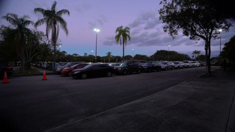 Drivers lined up before dawn on December 19, 2020, for free food in Boynton Beach, Florida. 