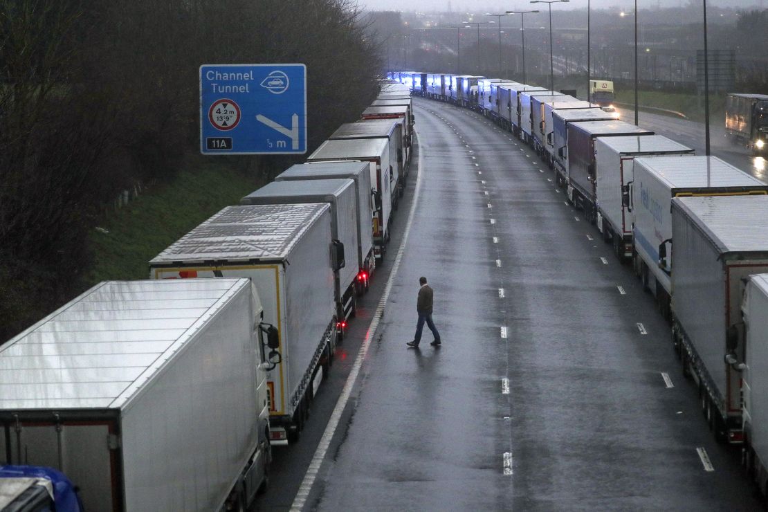 Trucks parked near Folkestone, Kent after the Port of Dover was closed and access to the Eurotunnel terminal was suspended after France said that it would not accept any passengers arriving from the UK for 48 hours.