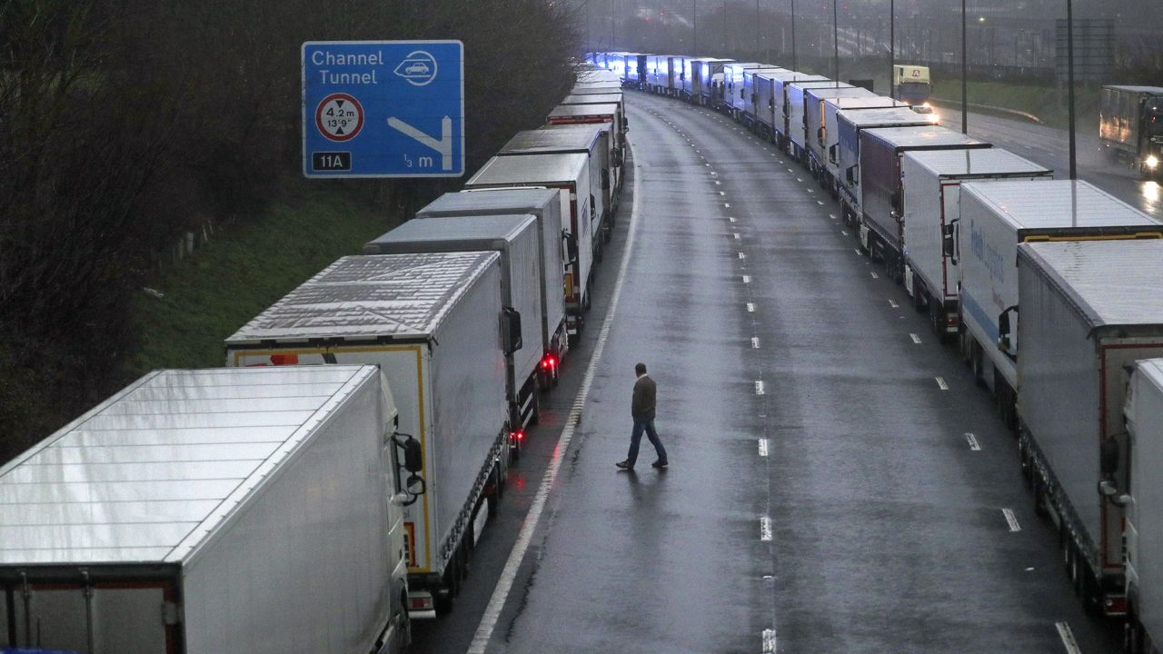 Trucks parked near Folkestone, Kent after the Port of Dover was closed and access to the Eurotunnel terminal was suspended after France said that it would not accept any passengers arriving from the UK for 48 hours.