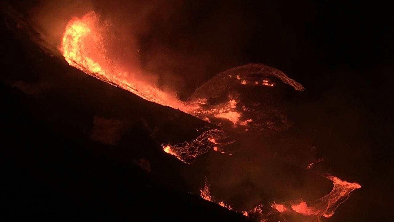 In this photo provided by the U.S. Geological Survey, lava flows within the Halema'uma'u crater of the Kilauea volcano Sunday, Dec. 20, 2020. The Kilauea volcano on Hawaii's Big Island has erupted, the U.S. Geological Survey said. (U.S. Geological Survey via AP)