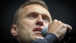 Russian opposition leader Alexei Navalny delivers a speech during a demonstration in Moscow on September 29, 2019. - Thousands gathered in Moscow for a demonstration demanding the release of the opposition protesters prosecuted in recent months. Police estimated a turnout of 20,000 people at the Sakharov Avenue in central Moscow about half an hour after the start of the protest, which was authorised. The demonstrators chanted "let them go" and brandished placards demanding a halt to "repressions" of opposition protesters. (Photo by Yuri KADOBNOV / AFP) (Photo by YURI KADOBNOV/AFP via Getty Images)