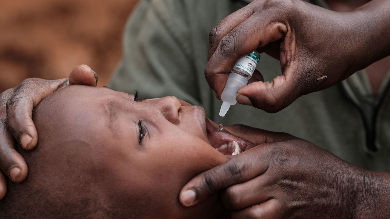 A boy receives drops of polio vaccine in Kajiado, Kenya, in 2018.