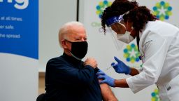 US President-elect Joe Biden receives a Covid-19 vaccination from Tabe Masa, Nurse Practitioner and Head of Employee Health Services, at the Christiana Care campus in Newark, Delaware on December 21, 2020.