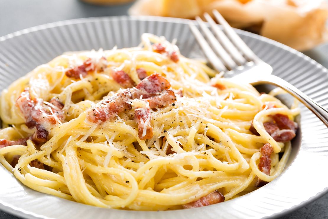 Start a new holiday tradition by making a simple yet indulgent spaghetti carbonara for Christmas dinner.