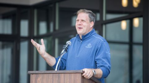 New Hampshire Gov. Christopher Sununu delivers remarks during the ribbon cutting ceremony for the grand opening of DraftKings Sportsbook Manchester on September 2, 2020 in Manchester, New Hampshire. 