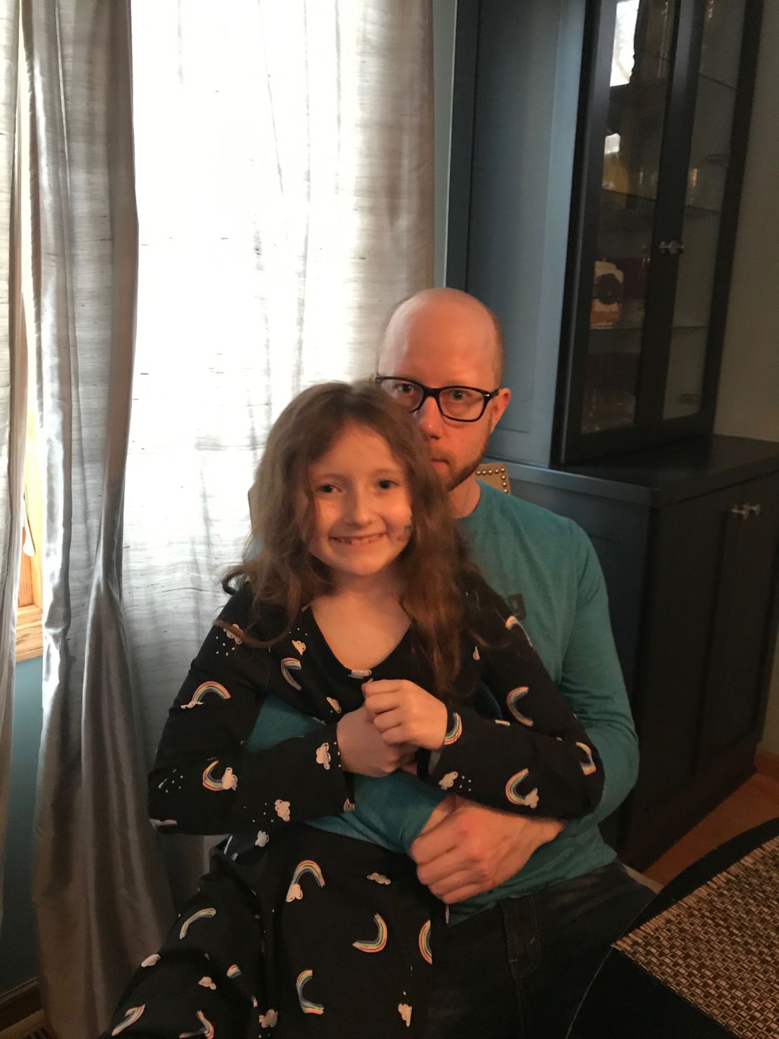 Bryan Clift with his daughter Iyla. Clift has been out of work since March and is behind on rent on his apartment in the suburbs of Minneapolis.