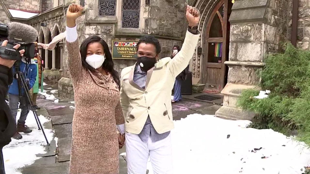 Oneita and Clive Thompson celebrate their freedom after ICE dropped its removal order.