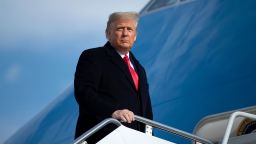 US President Donald Trump boards Air Force One at Joint Base Andrews in Maryland on December 12, 2020. - Trump travels to West Point, New York, to attend the Army-Navy football game. (Photo by Brendan Smialowski / AFP) (Photo by BRENDAN SMIALOWSKI/AFP via Getty Images)