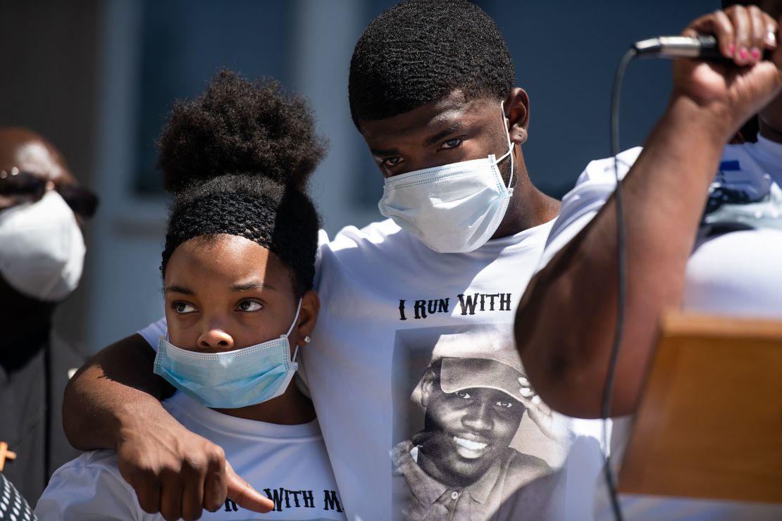 Family of Ahmaud Arbery embrace at the Glynn County Courthouse during a protest of the shooting death of Arbery on May 8, 2020 in Brunswick, Georgia. 