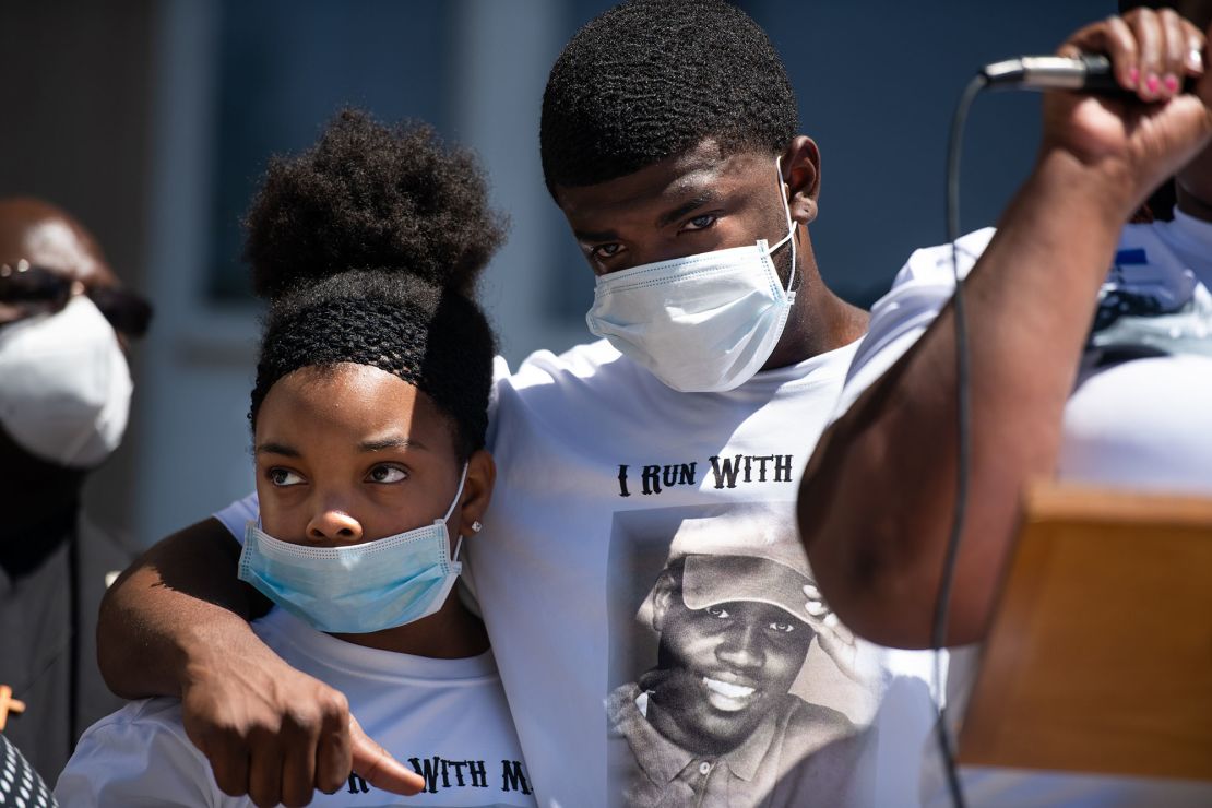 Family of Ahmaud Arbery embrace at the Glynn County Courthouse during a protest of the shooting death of Arbery on May 8, 2020 in Brunswick, Georgia.