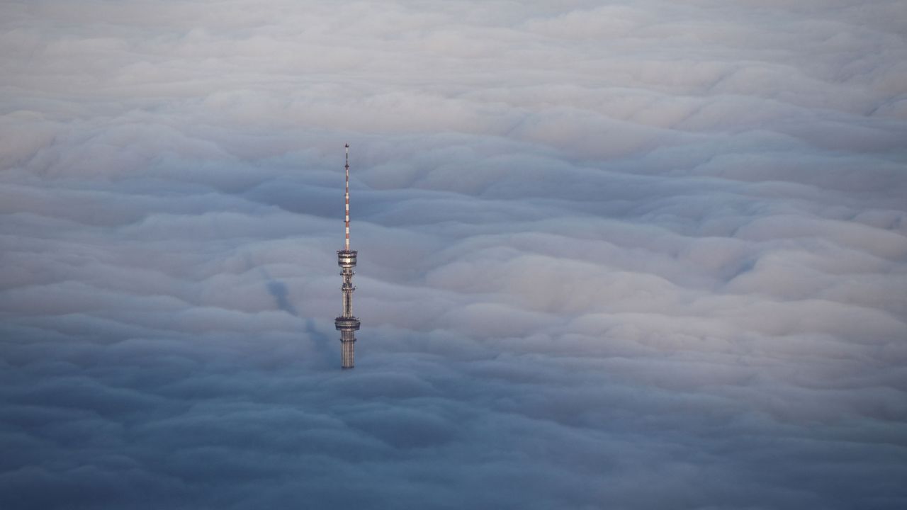 <strong>Almaty, Kazakhstan: </strong>The Almaty Television Tower pokes through a blanket of thick fog on the slopes of Kok Tobe mountain in the former capital of Kazakhstan.