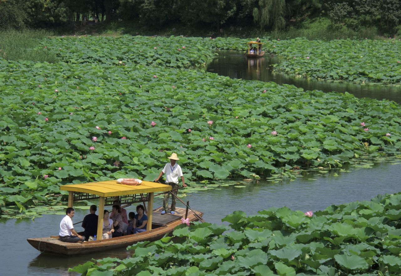 Visitors to the Old Summer Palace can still enjoy a boat trip on the complex's network of lakes and waterways.