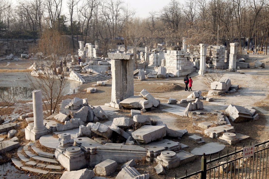 Visitors walk among the ruins of the Old Summer Palace in 2008.