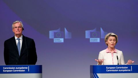 Ursula von der Leyen and Michel Barnier address a media conference on Brexit at EU headquarters in Brussels, Thursday, Dec. 24, 2020.