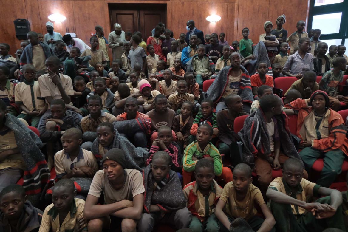 Released students gather at the state government house in Kankara, Nigeria, on Friday, December 18. <a href="https://www.cnn.com/2020/12/18/africa/rescued-nigerian-schoolboys-state-government-intl/index.html" target="_blank">More than 300 boys rescued</a> from a week's captivity in northwestern Nigeria were brought back to their waiting families in the state capital.