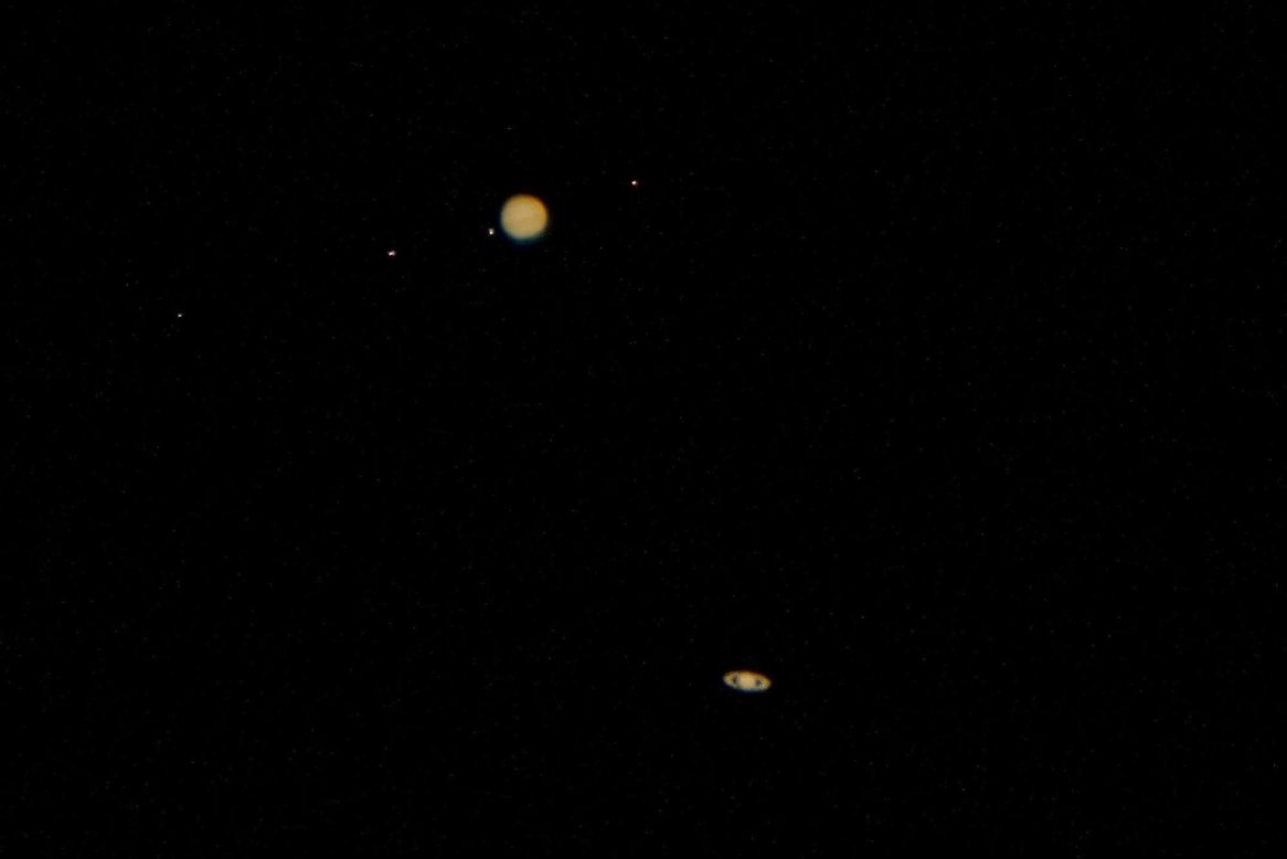 Jupiter, left, and Saturn are seen in conjunction from Kathleen, Georgia, on Monday, December 21. <a href="https://www.cnn.com/2020/12/22/world/jupiter-saturn-great-conjunction-images-scn-trnd/index.html" target="_blank">The two largest planets</a> in the solar system came closer together than they have been in 400 years on Monday.