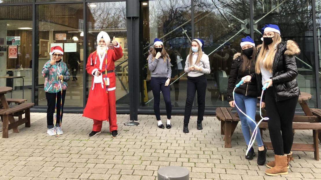 Rajinder Singh delivers Christmas presents as the "Skipping Sikh Santa." 