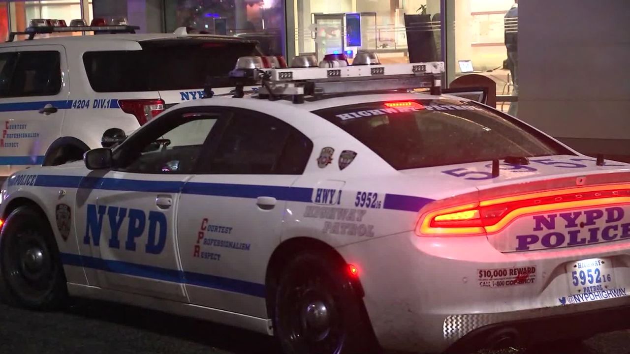 An NYPD officer was rushed to Kings County Hospital after being shot in the back in Brooklyn.
