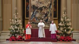 Pope Francis, center, delivers the Urbi et Orbi  Christmas' day blessing inside the blessing hall of St. Peter's Basilica, at the Vatican on December 25