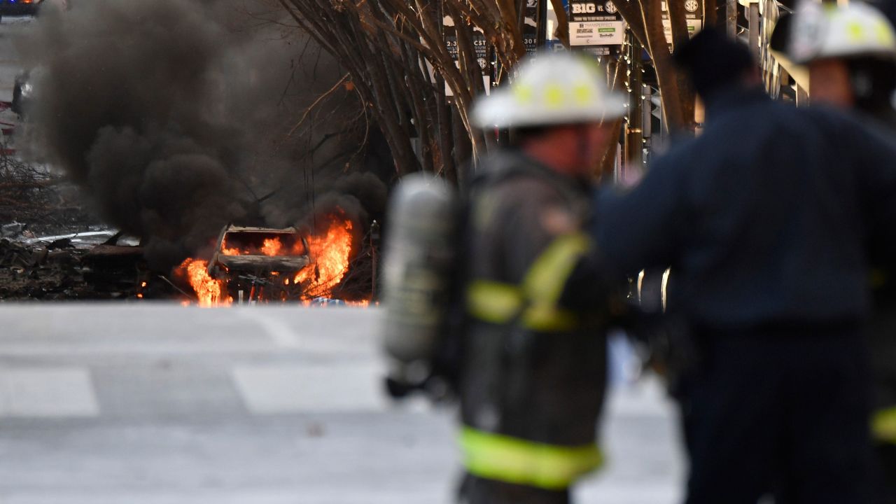 A vehicle burns following an explosion in downtown Nashville on Friday, December 25. 