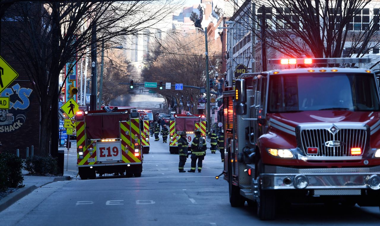 Firetrucks and emergency responders fill the streets following the explosion.