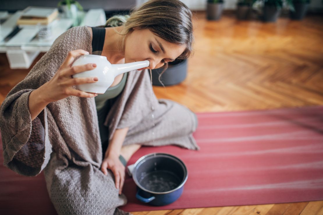 Using a well-maintained neti pot — no sharing — with sterilized water is another good option for safe removal of nose crusts.